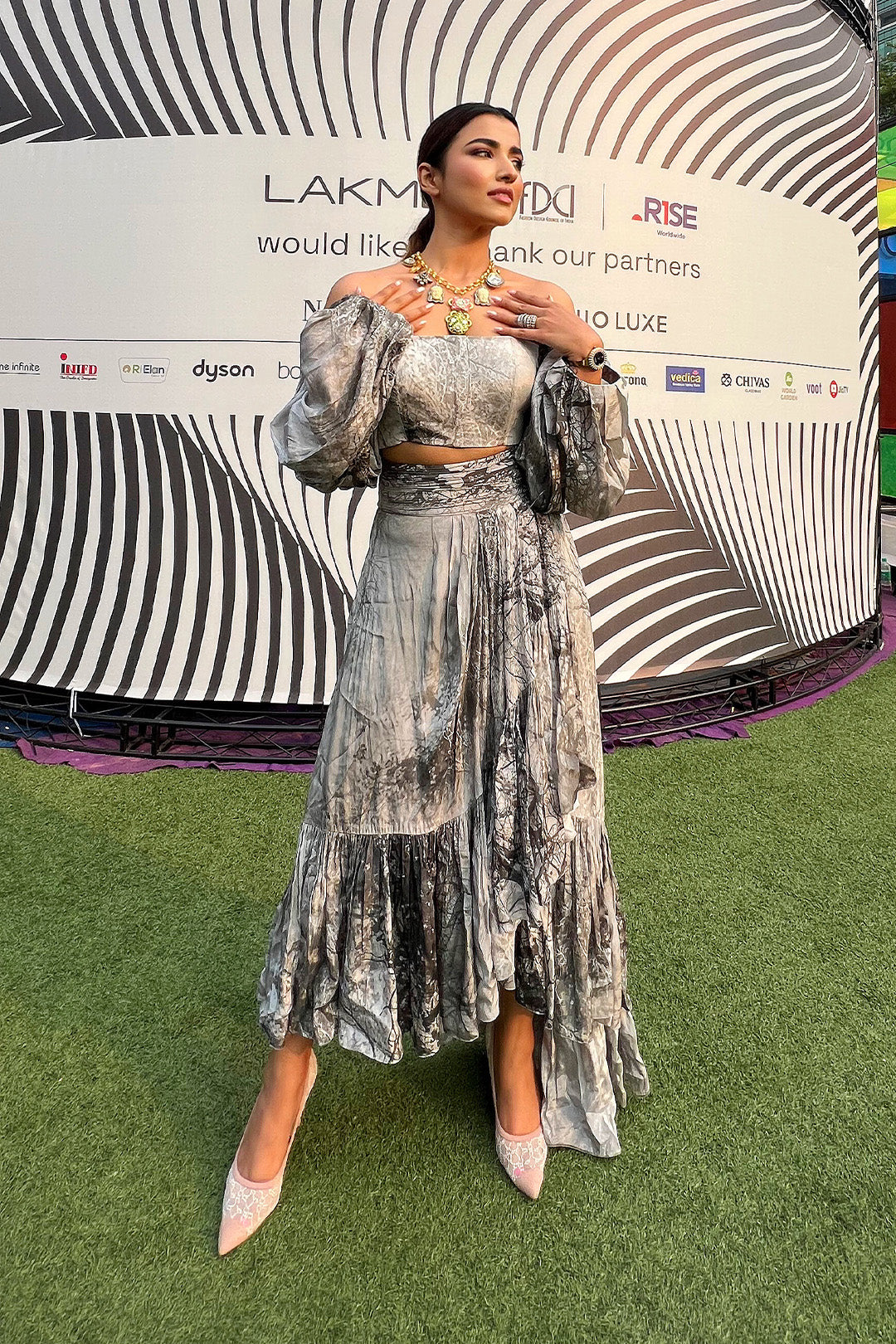 Kinjal Bhanushali in our Forest Printed Off-Shoulder Crop Top with Balloon Sleeves paired with Forest Printed Asymmetrical Skirt from Matrix Collection