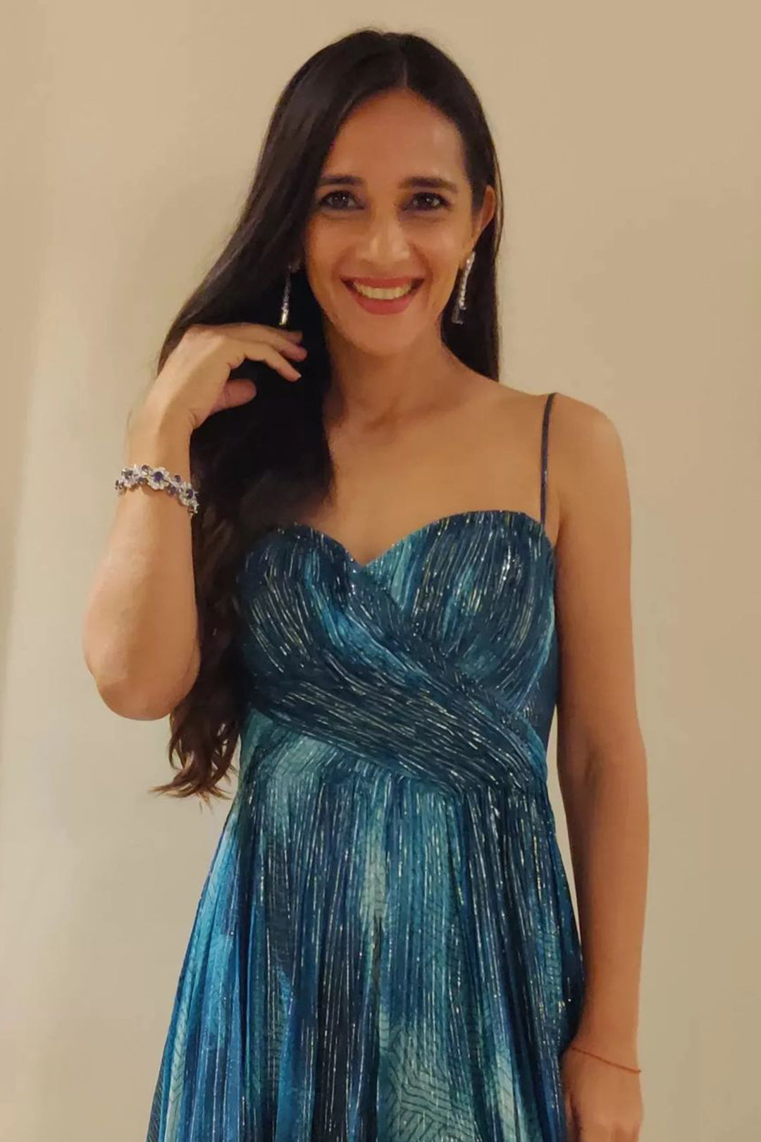 Tara Sharma Saluja in Nirmooha's Jade Blue Printed Drape Gown With Sweet Heart Neck & Slit from Matrix Collection